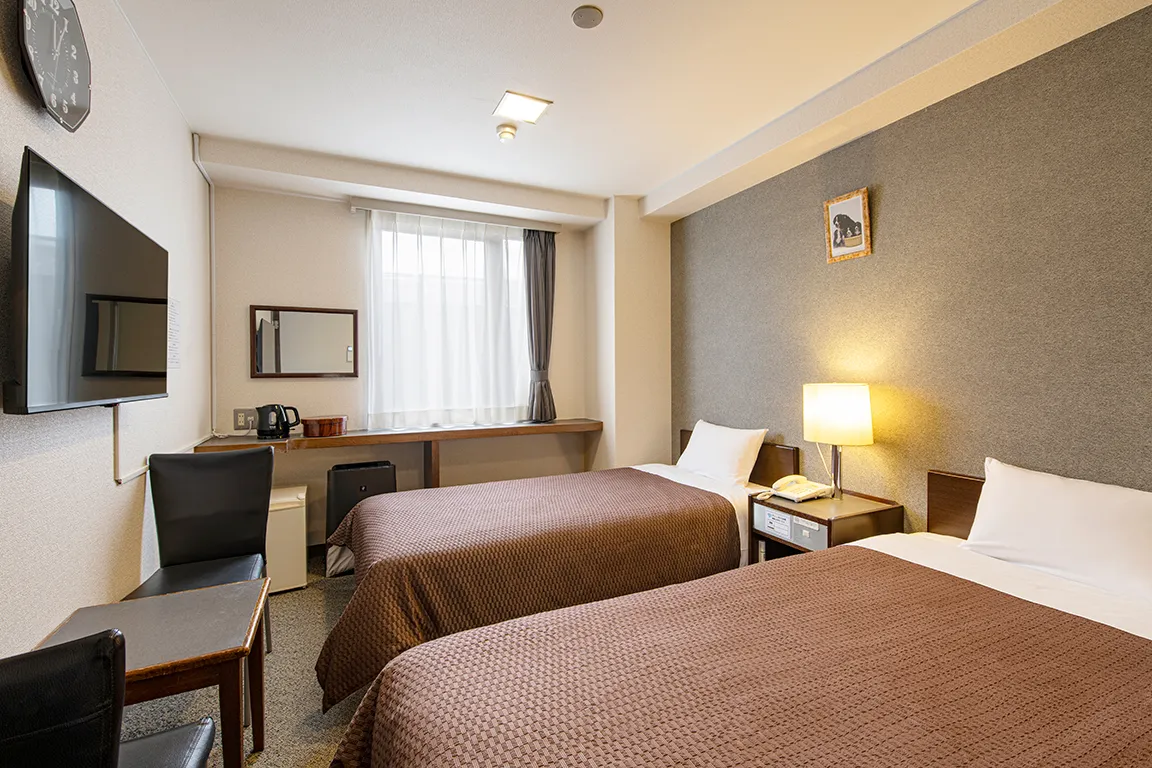 ゆったり寛ぐ、温もり感じるツインルーム